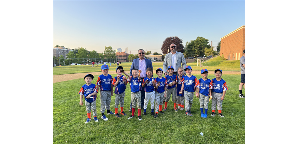 Gino Bello Homes officials support their Rookie team's recent game and brought donuts!